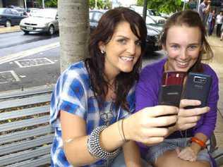 Maddie Orchard from East Ballina, and Katie Cross from East Lismore, admit to using their mobile phones while driving even though they know it’s dangerous. . Picture: Cathy Adams