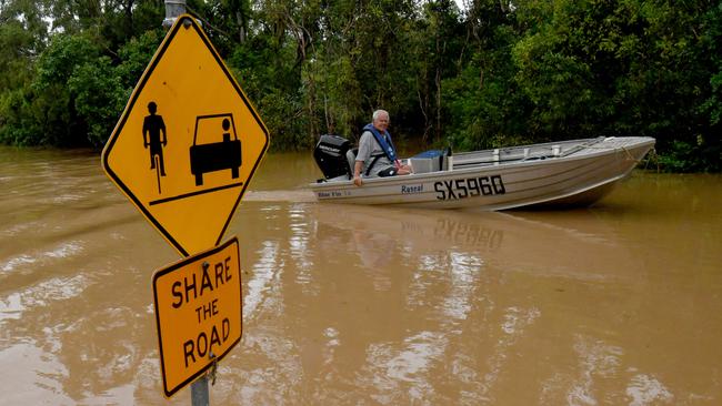 Tuesday February 12.. Heavy rain causes flooding in North Queensland. Groper Creek, near Home Hill cut off by flooding. Long term resident Roger Wilkie. Picture: Evan Morgan