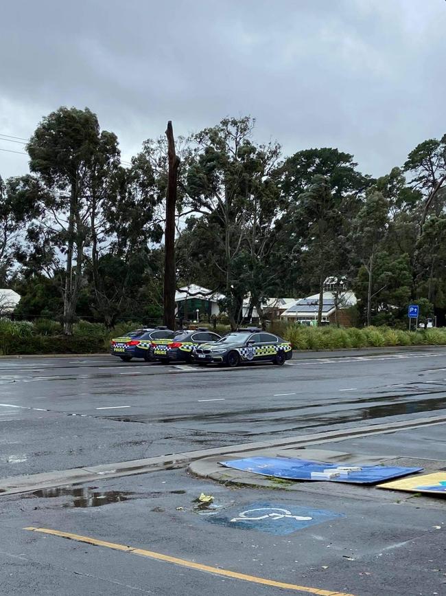 Police on Mt Dandenong Tourist Rd in Montrose preventing traffic from travelling up to the hills. Picture: Aaron Puddy