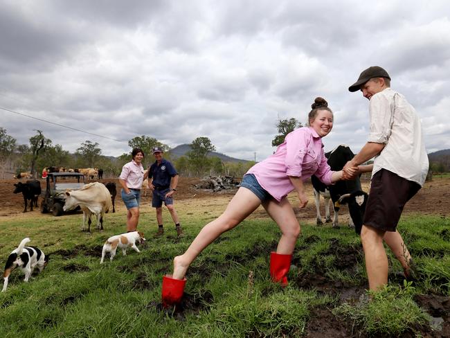 Kay and Dave Tommerup, with kids Harry, 21, Georgia, 17, on Tommerup's Dairy Farm which has finally has some rain. Picture: Steve Pohlner/AAP