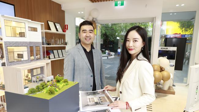 Peter Li and Fiona Yang, who run Plus Agency, show Chinese buyers properties while they are on holidays in Australia. Picture: Tim Hunter