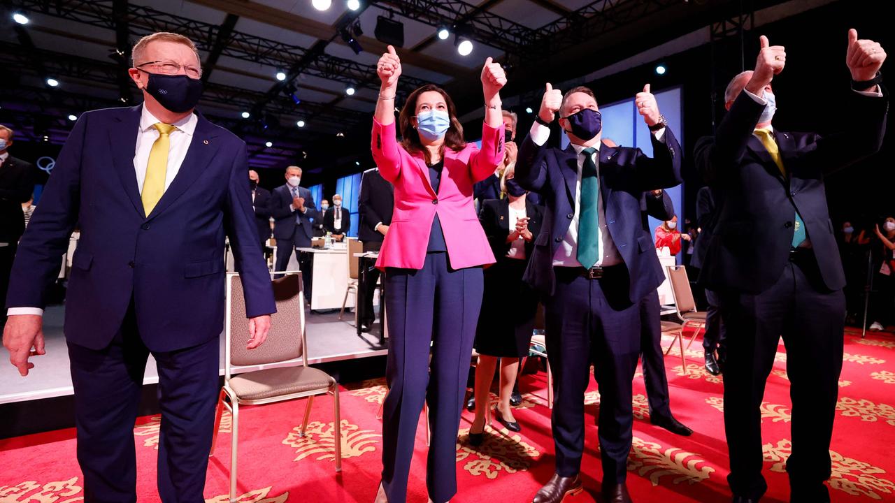 (From L to R) Members of the Brisbane 2032 delegation head of the Australian Olympic Committee John Coates, Queensland Premier Annastacia Palaszczuk, Brisbane mayor Adrian Schrinner and Australia's Sports Minister Richard Colbeck celebrate after Brisbane was announced as the 2032 Summer Olympics host city during the 138th IOC Session in Tokyo on July 21, 2021. Photo: Toru Hanai