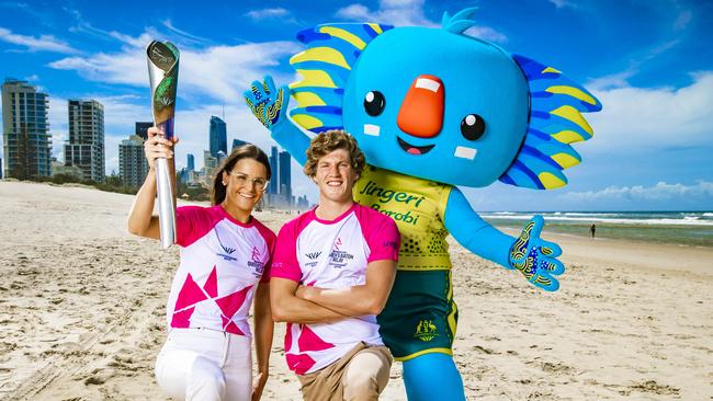 Olympic swimmers Kaylee McKeown and Brendon Smith with Australian team mascot Borobi show off the Commonwealth Games Queen’s baton. Picture: Nigel Hallett