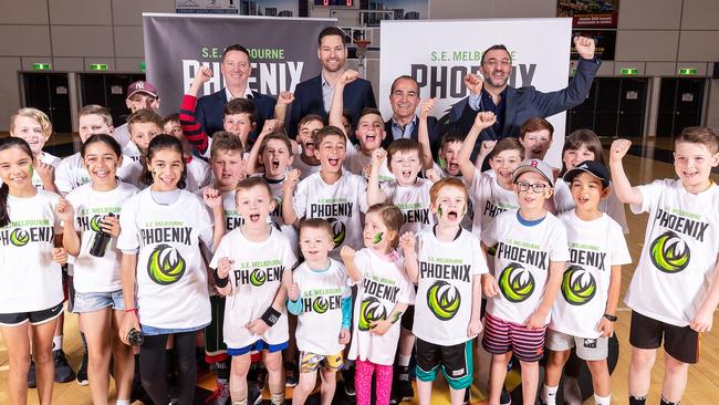 South East Melbourne Phoenix head coach Simon Mitchell, general manager Tommy Greer, Victorian deputy premier James Merlino and NBL chief executive Jeremy Loeliger help launch the Phoenix Picture: Daniel Pockett (Getty Images)