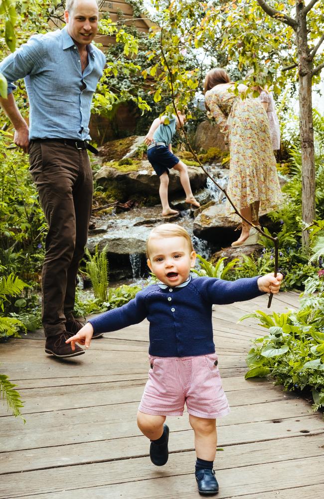 The Duchess of Cambridge, far right, with Prince George and Princess Charlotte, while Prince William keeps an eye on Prince Louis at the Chelsea Flower Show. Picture: Getty Images