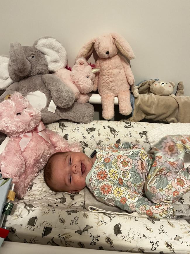 Charlie Arlow. 10 weeks old. She loves tummy time, looking at books and smiling.