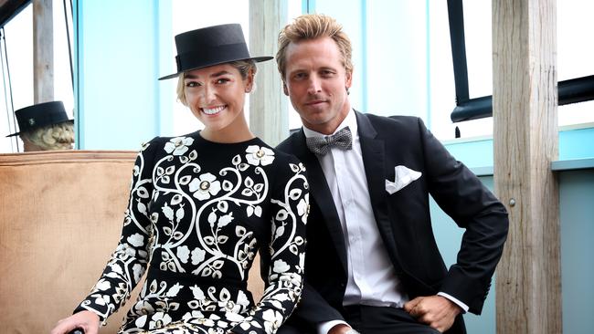 Ashley Hart and Buck Palmer pictured at the Swisse Marquee at Derby Day at the 2015 Melbourne Cup Carnival held at Flemington Racecourse in Melbourne.