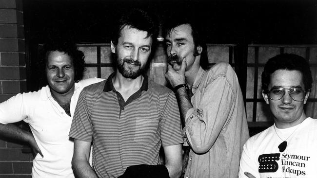 Australian rock band Spectrum pictured left to right, Ray Arnott, Michael Rudd, Bill Putt, and community radio star Tony Fossey in March, 1984.