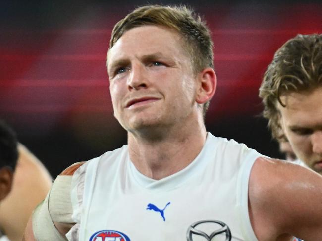 MELBOURNE, AUSTRALIA - JUNE 04: Luke McDonald and Jack Ziebell of the Kangaroos look dejected after losing the round 12 AFL match between Essendon Bombers and North Melbourne Kangaroos at Marvel Stadium, on June 04, 2023, in Melbourne, Australia. (Photo by Quinn Rooney/Getty Images)