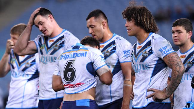 Titans' players look on following a try scored by William Smith of the Eels during the round 24 NRL match between the Parramatta Eels and the Gold Coast Titans at ANZ Stadium in Sydney on Thursday, August 17, 2017. (AAP Image/Paul Miller) NO ARCHIVING, EDITORIAL USE ONLY