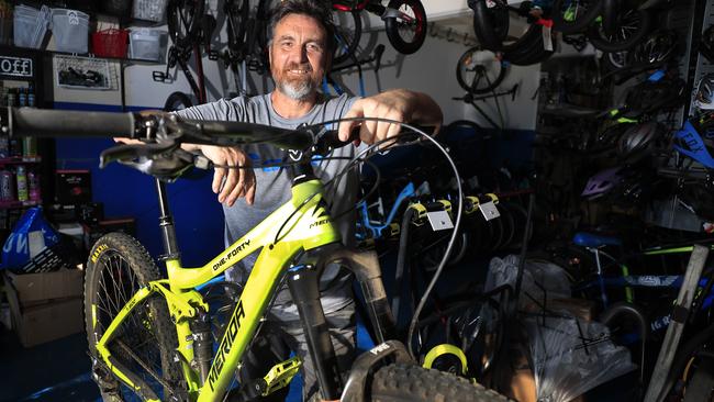 Darren Martin from Border Bikes at Tweed Heads South is being rushed off his 'pedals' with demand for bikes of all types including stationary bikes. Photo: Scott Powick Newscorp