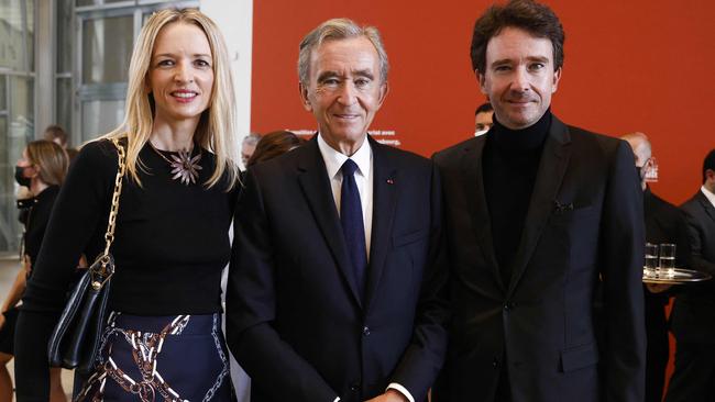 Arnault with his daughter, Louis Vuitton executive vice president Delphine, and his son, LVMH communications head Antoine. Picture: AFP