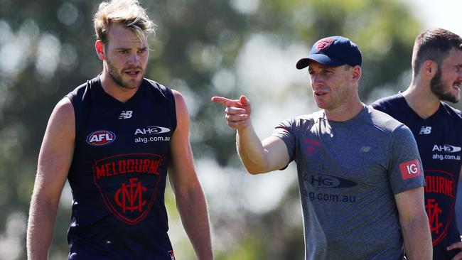Jack Watts talks with coach Simon Goodwin. Picture: Michael Klein