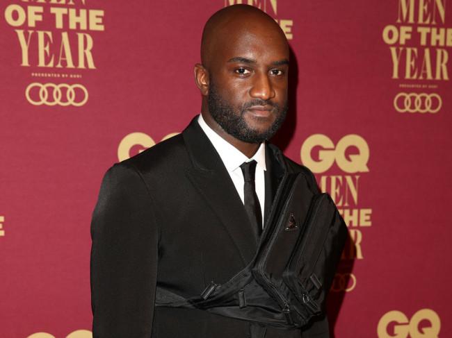 Virgil Abloh, wearing a purple sweatshirt, blue jeans and brown Louis  News Photo - Getty Images