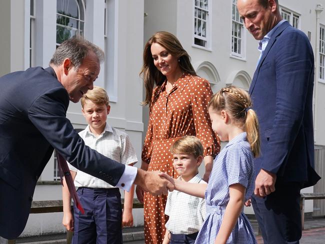 Headmaster Jonathan Perry greets the royal family. Picture: Jonathan Brady/Getty Images