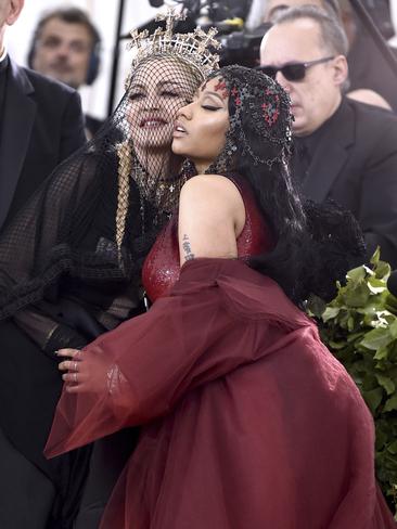 Madonna and Nicki Minaj srike a pose together. Picture: AP