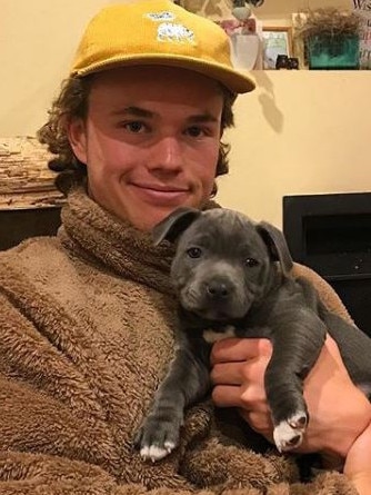 Melbourne’s Jayden Hunt with Simba as a pup. Picture: Instagram