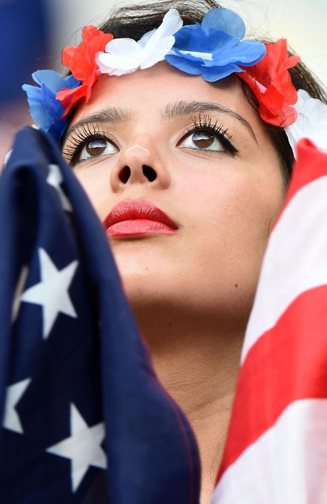 A US fan watches the game against Portugal.