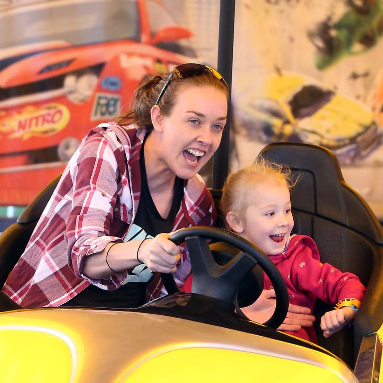 Taryn Frewin goes for a spin with Maddison Kelly, 3. Picture: Richard Gosling