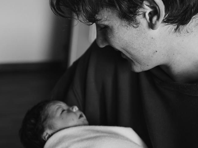 Port Power player Connor Rozee with his newborn daughter Audrey Sarah Rozee. Picture: Instagram