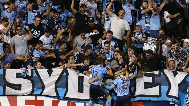 Cameron Devlin celebrates with supporters after scoring a goal against Adelaide United.. Picture: Getty