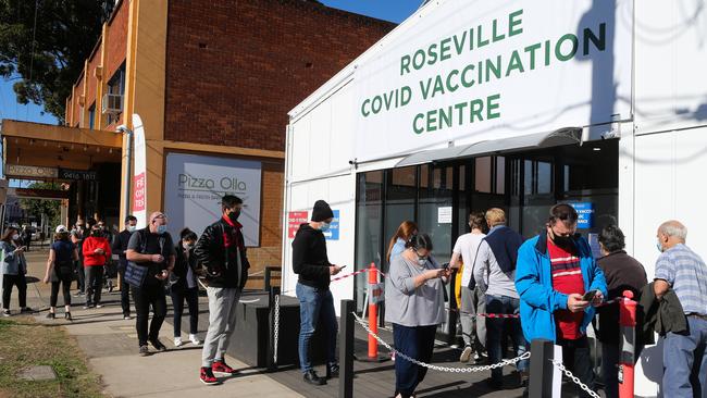 People line up to get a Covid-19 vaccine or test at the new dual clinic in Roseville, in Sydney’s north, on Tuesday. Picture: Gaye Gerard