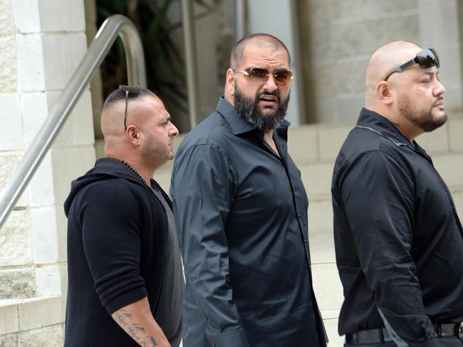 Comrades in arms: Friends of Mick Hawi gather at the Al-Zahra Mosque. Picture: Jeremy Piper.