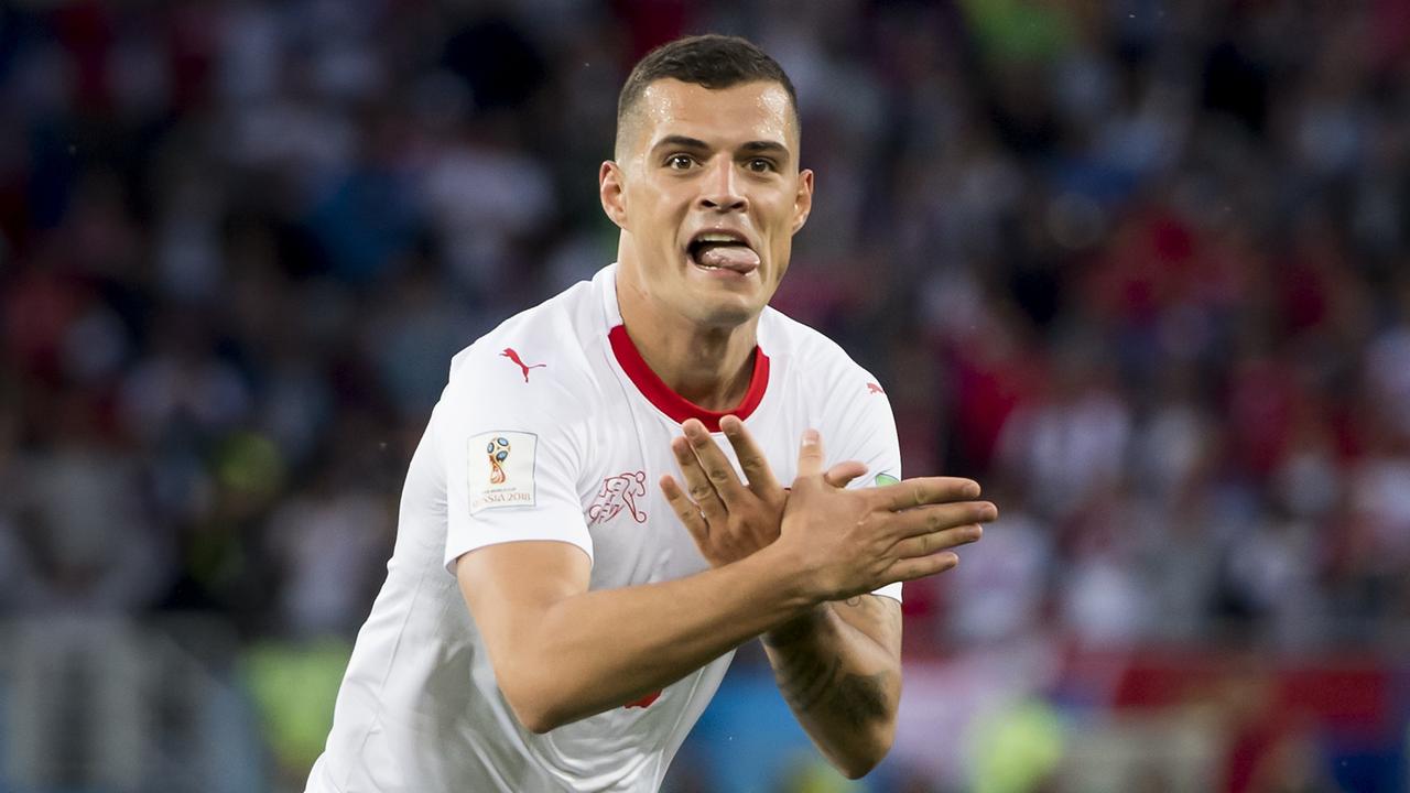 Granit Xhaka and Xherdan Shaqiri escape ban over Swiss celebration