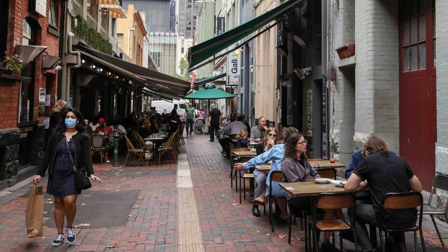 People dining in Hardware Lane in Melbourne's CBD. Picture: Ian Currie.