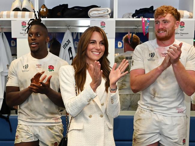MARSEILLE, FRANCE - OCTOBER 15: Catherine, Princess of Wales and Patron of the Rugby Football Union congratulates the England team on their victory in the changing room following the Rugby World Cup France 2023 Quarter Final match between England and Fiji at Stade Velodrome on October 15, 2023 in Marseille, France. (Photo by Dan Mullan/Getty Images)