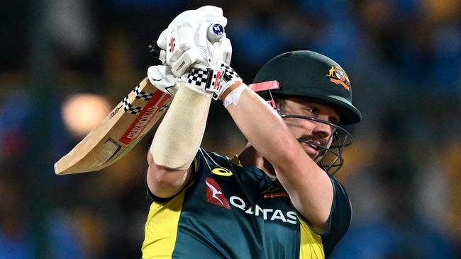 Travis Head will drop back to the middle order for Australia’s Tests. Picture: AFP
