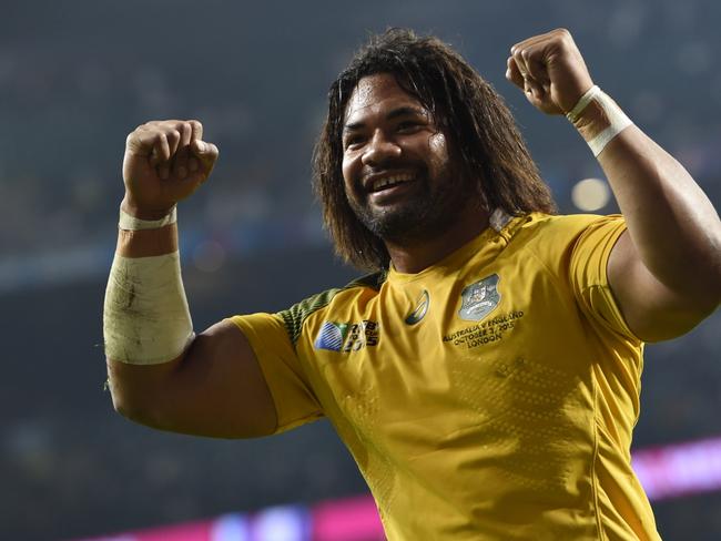 Australia's hooker Tatafu Polota-Nau celebrates after winning a Pool A match of the 2015 Rugby World Cup between England and Australia at Twickenham stadium, south west London, on October 3, 2015. AFP PHOTO / LOIC VENANCE RESTRICTED TO EDITORIAL USE, NO USE IN LIVE MATCH TRACKING SERVICES, TO BE USED AS NON-SEQUENTIAL STILLS