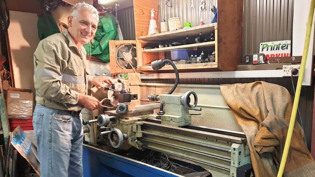 Charles Camenzuli at work on the lathe in his own men’s shed at home. 