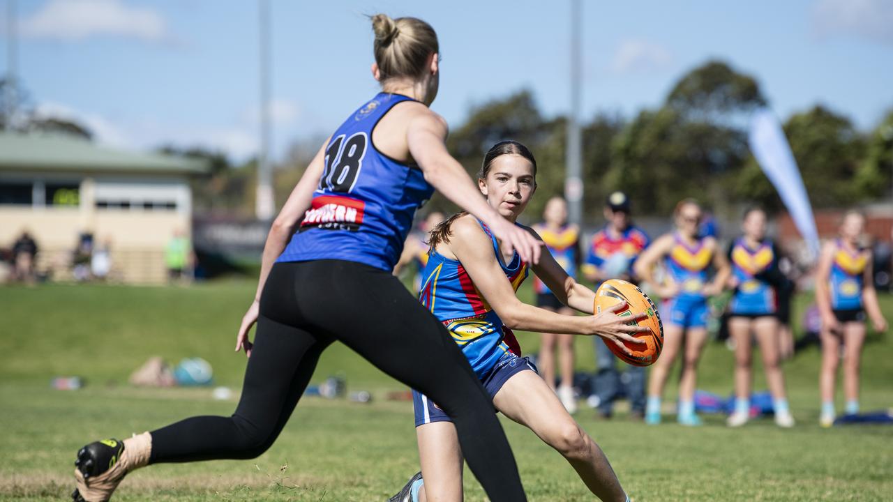 Piper York of Highfields steps against Saints.