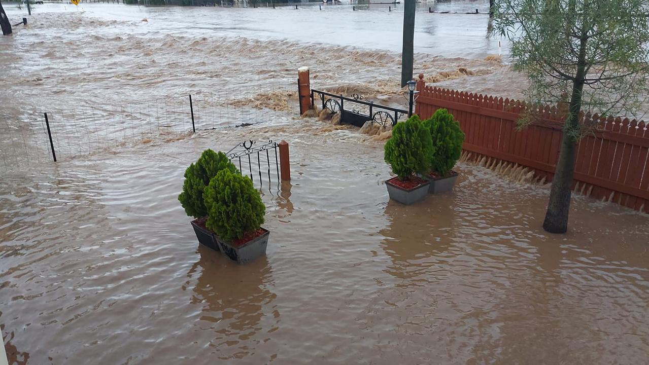 Floodwaters outside a house in Jandowae, taken by Warren Kearney.