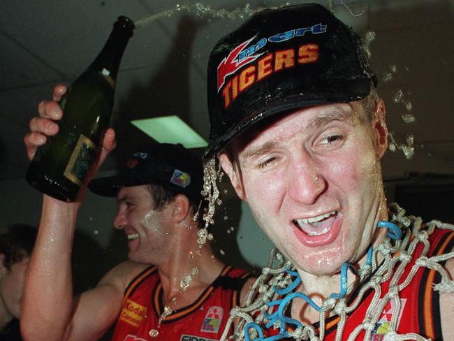 Andrew Gaze (R) and Josh’s father, Warrick, celebrating the Melbourne Tigers’ 1997 Championship. Picture: Michael Klein