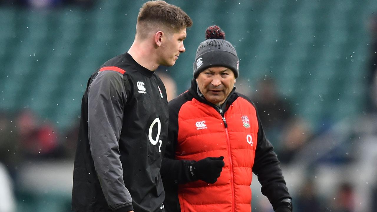 England coach Eddie Jones talks with Owen Farrell at Twickenham.