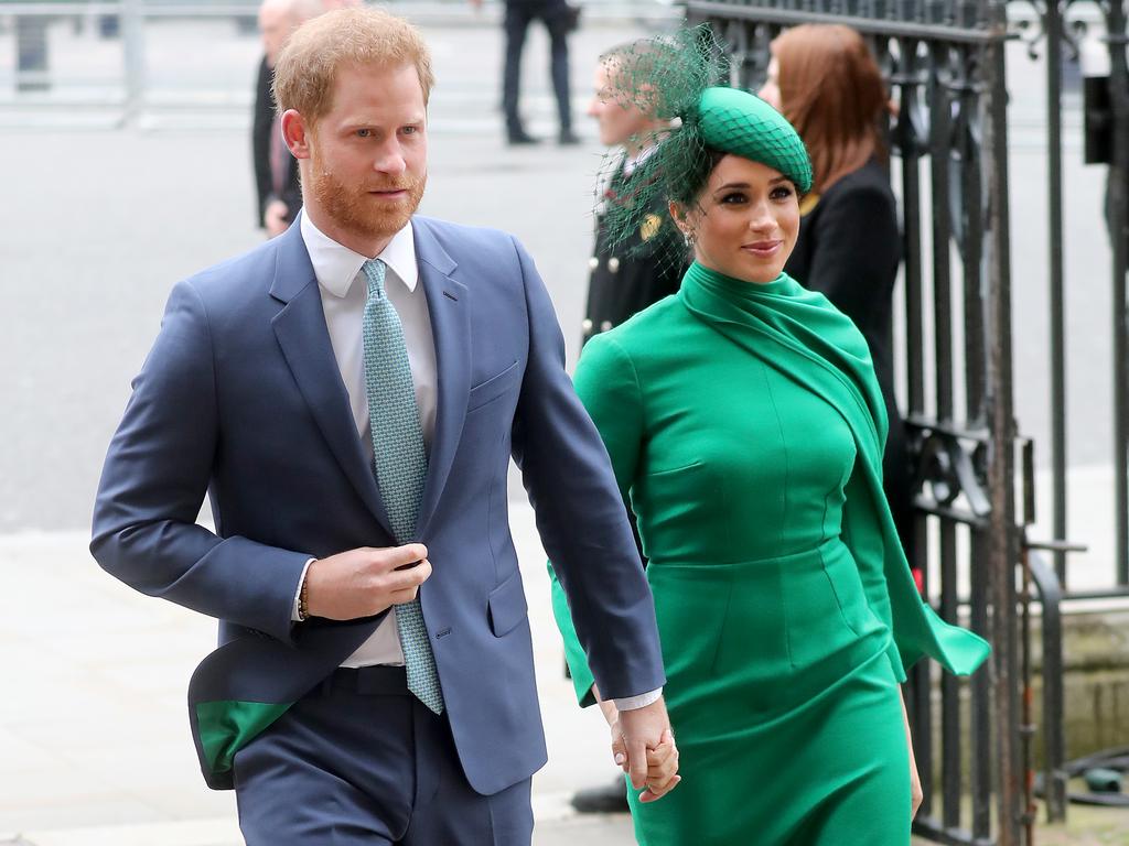 Harry and Meghan on their way to Rooty Hill RSL.