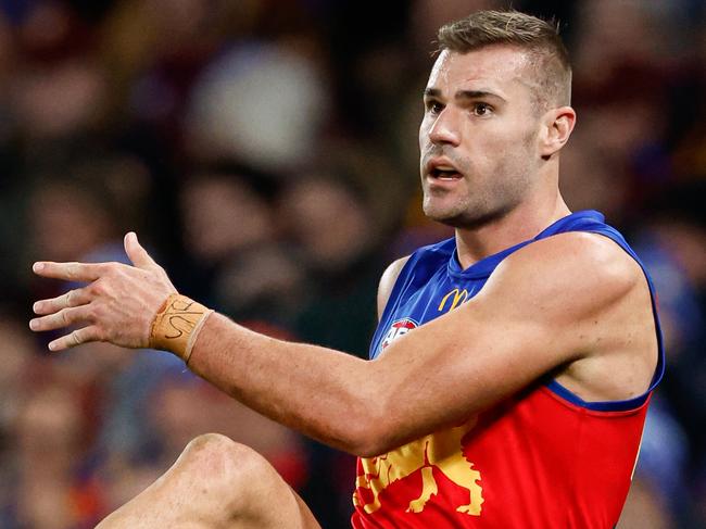 MELBOURNE, AUSTRALIA - JUNE 07: Jack Payne of the Lions kicks the ball during the 2024 AFL Round 13 match between the Western Bulldogs and the Brisbane Lions at Marvel Stadium on June 07, 2024 in Melbourne, Australia. (Photo by Dylan Burns/AFL Photos via Getty Images)