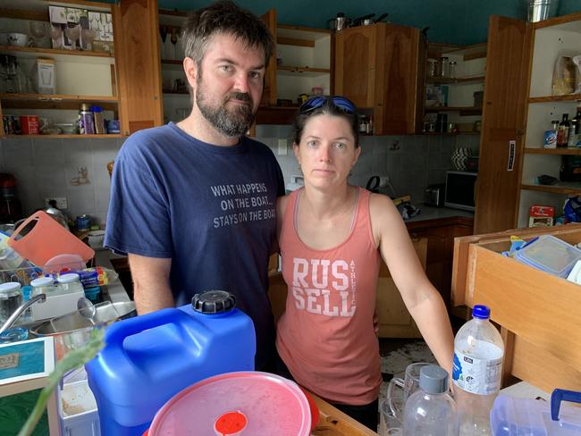 Jesse and Denise Perkins in their flood-ravaged North Lismore home on March 5, 2022. Picture: Stuart Cumming
