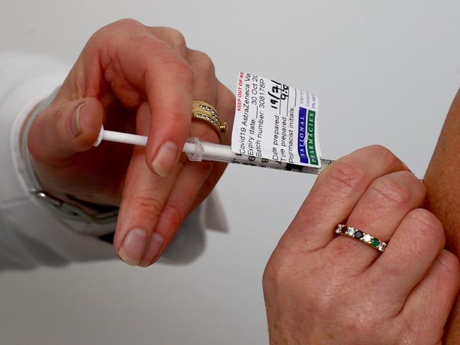 ADELAIDE, AUSTRALIA - NewsWire Photos JULY 19 2021: Chief Pharmacist Robyns Johns gives Sue Fishlock her 2nd dose of the AstraZeneca vaccine at the Littlehampton National Pharmacies in the Adelaide Hills. Picture: NCA NewsWire / Kelly Barnes