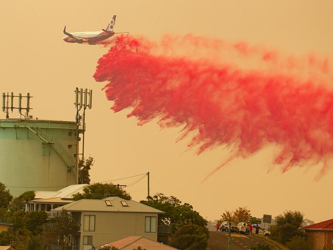 The Marie Bashir in action over Harrington, 335km north east of Sydney, in November. Picture: AAP/Shane Chalker