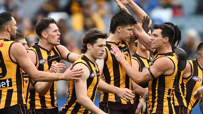 Mitch Lewis is congratulated by teammates after kicking a goal. Picture: Getty Images