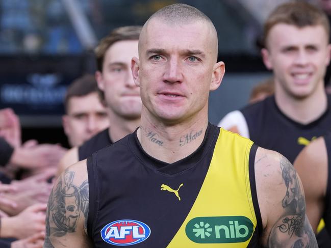 MELBOURNE, AUSTRALIA - JUNE 30: Dustin Martin of the Tigers runs out with the team during the round 16 AFL match between Richmond Tigers and Carlton Blues at Melbourne Cricket Ground, on June 30, 2024, in Melbourne, Australia. (Photo by Daniel Pockett/Getty Images)