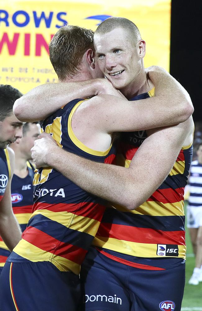 Sam Jacobs and Tom Lynch embrace after the win. Picture: Sarah Reed