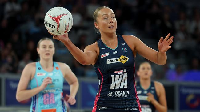 Hannah Mundy of the Vixens passes the ball during the round four Super Netball match between Melbourne Mavericks and Melbourne Vixens. Photo: Getty Images