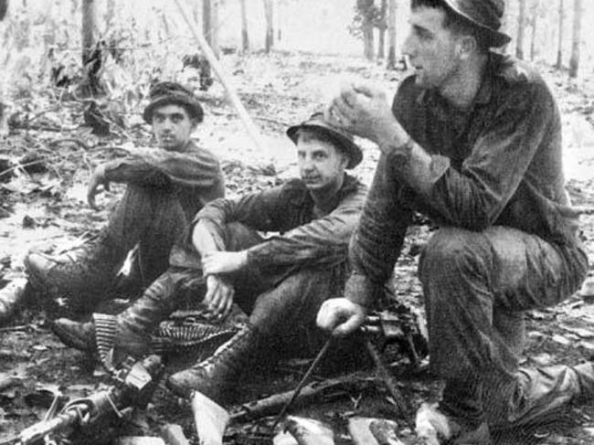 Australian troops rest during the Battle of Long Tan.