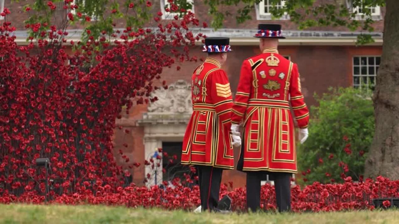 Blood-red ceramic poppies 'flow across’ Tower of London for VE Day