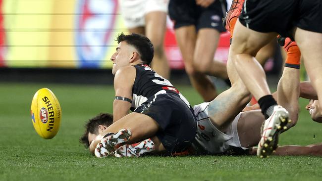 Nick Daicos faces a nervous wait after this tackle. Picture: Phil Hillyard