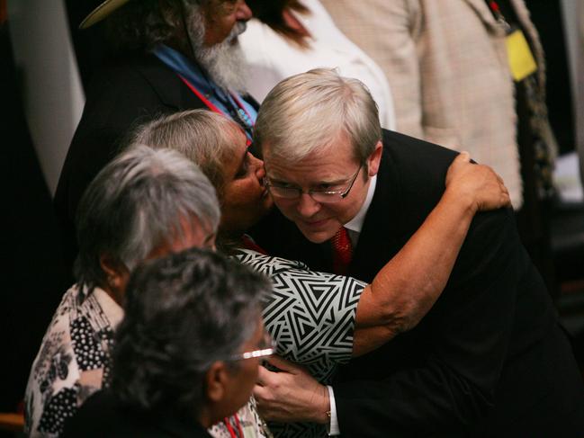 Prime Minister Kevin Rudd hugs and kisses Aboriginal members of the stolen generation that were in the House of Representatives when Rudd delivered the official apology (sorry) speech to the Aboriginal people, at Parliament House in Canberra.